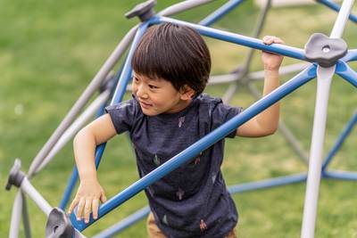 Child Playing on Jack and June Jungle Gym a Outdoor Backyard Climbing Structures.